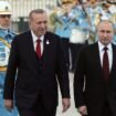 The President of Turkey Recep Tayyip Erdogan and his Russian counterpart Russia's Vladimir Putin (R) review the honour guard at the Presidential Complex in Ankara on April 3, 2018.  
President Vladimir Putin arrived for a visit to Russia's increasingly close partner Turkey aimed at launching the construction of a nuclear power plant and coordinating policy on the war in Syria. / AFP PHOTO / ADEM ALTAN