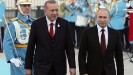 The President of Turkey Recep Tayyip Erdogan and his Russian counterpart Russia's Vladimir Putin (R) review the honour guard at the Presidential Complex in Ankara on April 3, 2018.  
President Vladimir Putin arrived for a visit to Russia's increasingly close partner Turkey aimed at launching the construction of a nuclear power plant and coordinating policy on the war in Syria. / AFP PHOTO / ADEM ALTAN