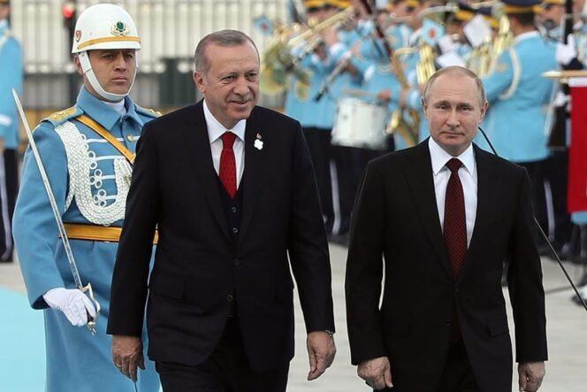
					The President of Turkey Recep Tayyip Erdogan and his Russian counterpart Russia's Vladimir Putin (R) review the honour guard at the Presidential Complex in Ankara on April 3, 2018.  
President Vladimir Putin arrived for a visit to Russia's increasingly close partner Turkey aimed at launching the construction of a nuclear power plant and coordinating policy on the war in Syria. / AFP PHOTO / ADEM ALTAN